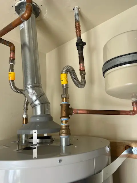 Water heater installation and plumbing repair in Burns Crossroads